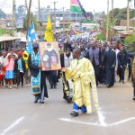 Thousands of christians march wth the icon of St Chrysostomos